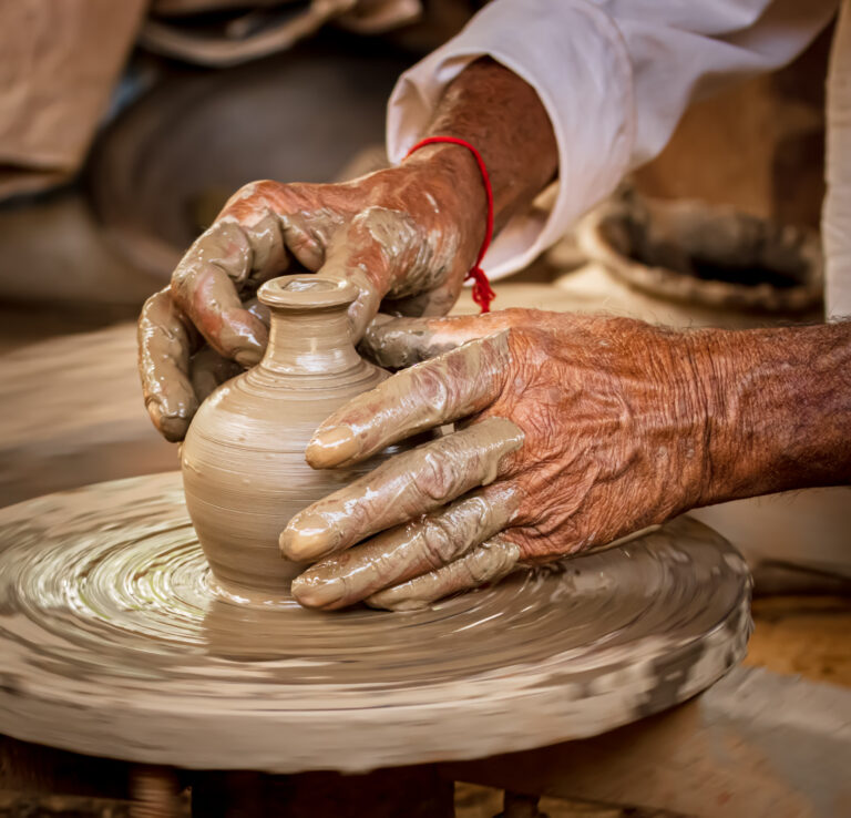 Potter at work makes ceramic dishes. India, Rajasthan